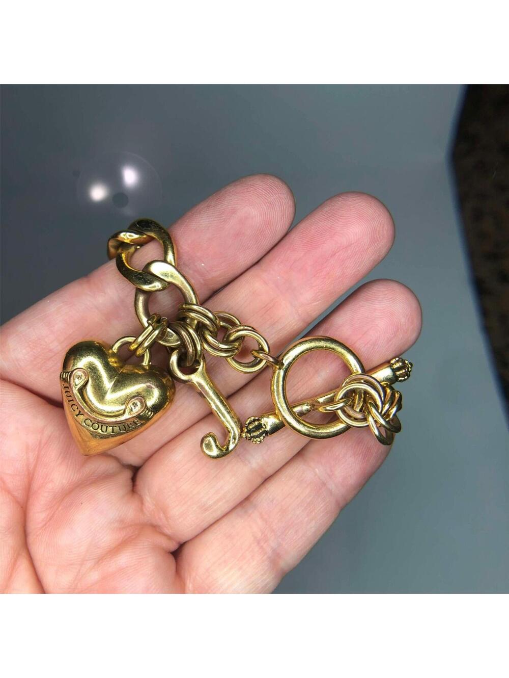 1104 Juicy Couture gold tone Puffy heart J charm toggle bracelet 7.5"